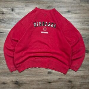 faded and distressed nike center swoosh vintage nebraska huskers crewneck